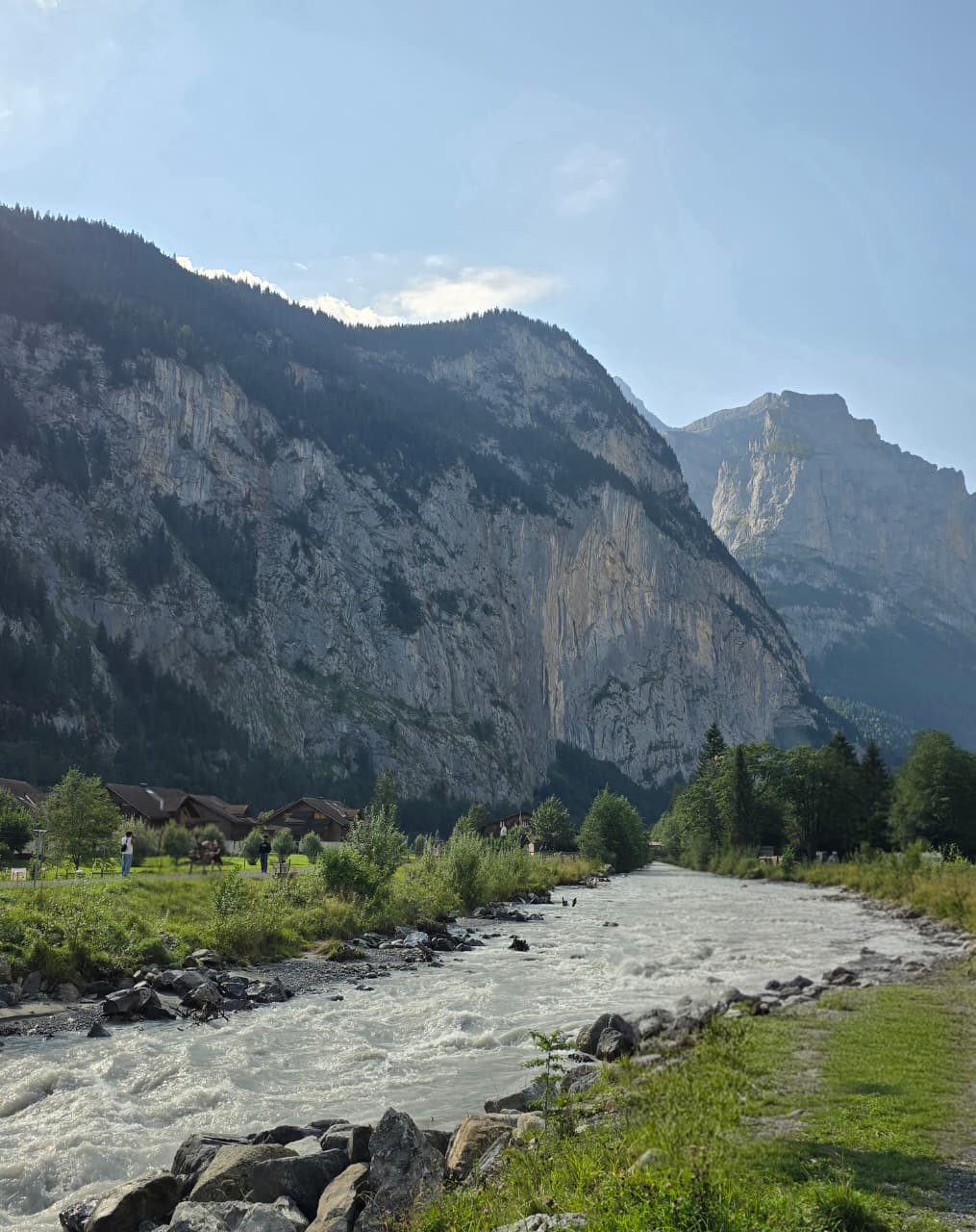 The Weisse Lütschine river rushing through the Lauterbrunnen valley cliffs