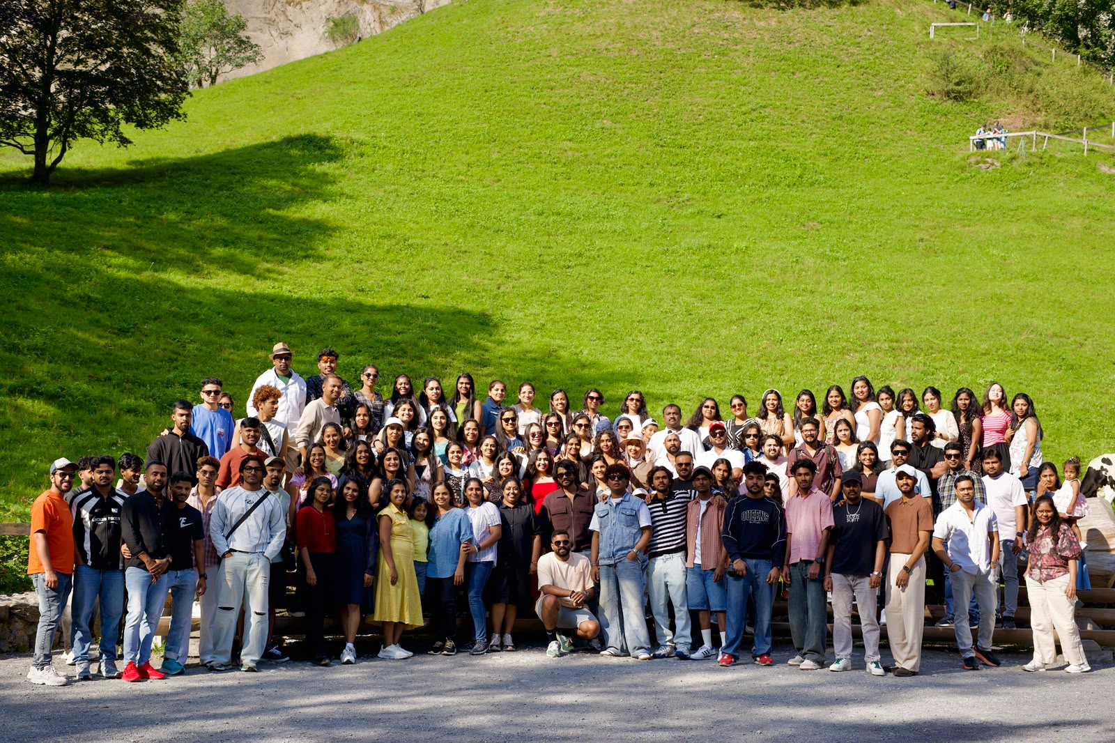 The whole tour group gathered on a green Swiss hillside on Independence Day