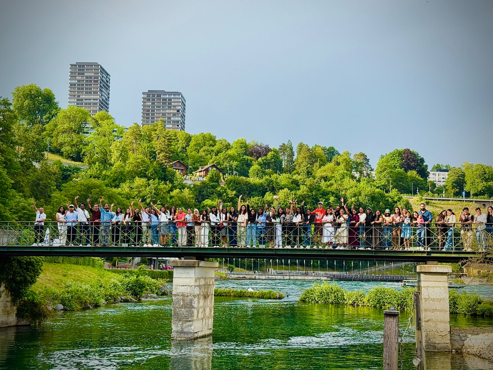 Travellers waving from the bridge at Rhine Falls, Switzerland