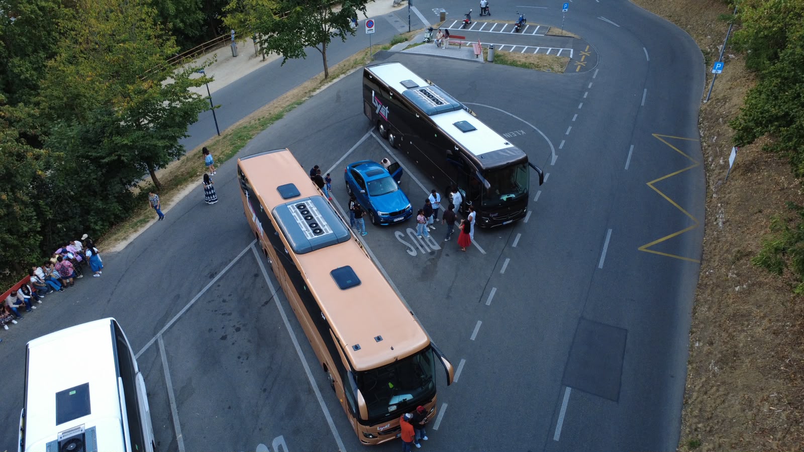 Aerial view of our two Lyst coaches parked before the Switzerland departure